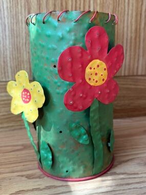 Tin floral tea light holder luminary,brings rustic charm to 
indoor or outdoor